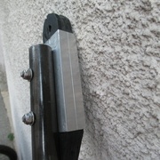 Pièce alu de maintient des caoutchoucs