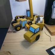 Tombrau articulé , chargeur télescopique et niveleuse