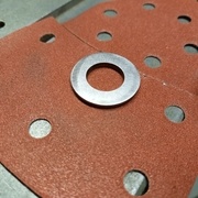 Rondelle poncée plane sur les deux faces