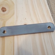 La barre pour tenir le fer.