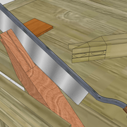 **5/** Le sciage des petites joues du sifflet central.