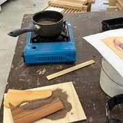 Chauffage du sable pour ombrer le placage