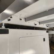 Vis de réglage d'une des tables