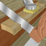 **2/** Trait de scie  effectué complètement.