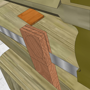 **d bis/** Apres retournement de la pièce, nous descendons la joue complète, en se laissant guider par le premier sciage de façon horizontale .