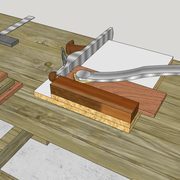 3 bis/ Nous plaçons la pièce à recaler contre le guide de la boite, puis avec un valet.