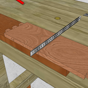 **4/** avec le réglet, nous vérifions le droit de nos entailles.