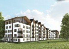 Un immeuble de 4 étages en bois massif.