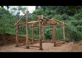 Une maison à la main