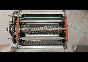 Montage d'un arbre hélicoïdale à plaquettes carbures sur une Kity 636