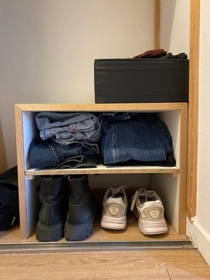 Caisson de rangement pour vêtements