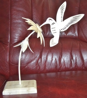 Colibri sur sa fleur