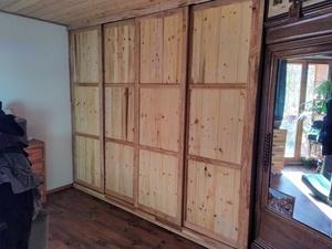 Placard portes coulissantes tout en massif