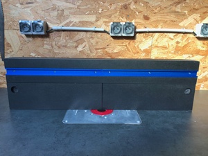 Un guide de défonceuse sous table aux joues pleines