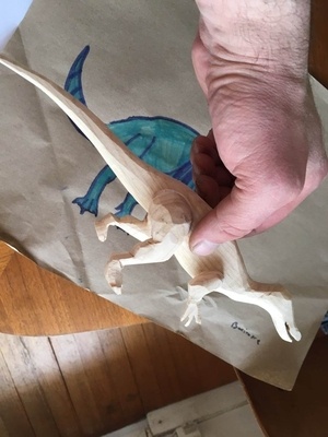 Dinosaure en frênes en cours de réalisation