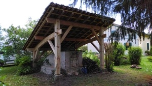 Réfection de l'abri d'un four à pain