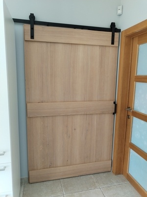 Porte coulissante en chêne