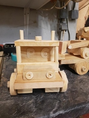 Semi remorque et tractopelle