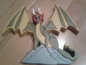 Dragon sur rocher création