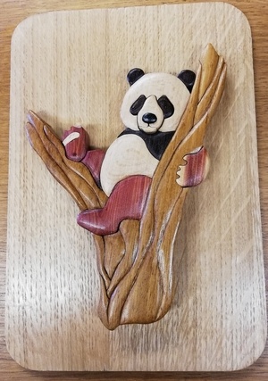 Tableau d'un panda en intarsia