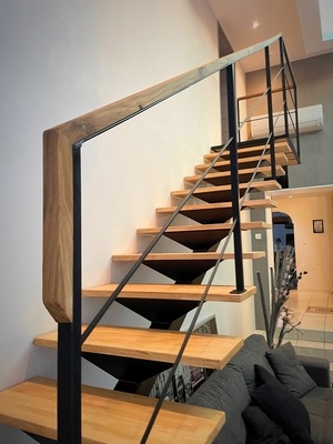 Escalier liment central bois/métal avec plateforme