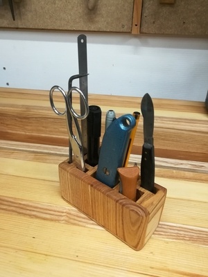 Assistant d'atelier.