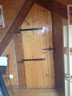 Porte en lames de parquet en soupente