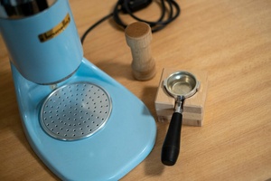 Socle pour porte filtre de machine à café