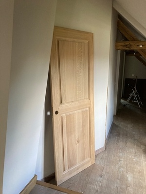 Porte coulissante en bois