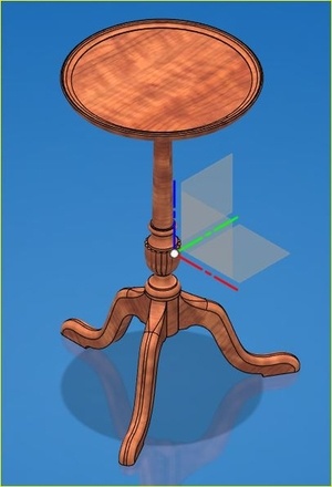 Un petit guéridon en acajou.