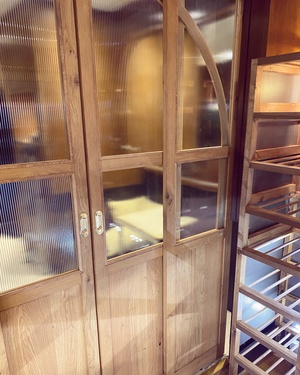 Porte coulissante chêne et vitrage