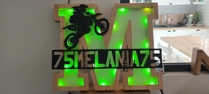 M comme Mélania et Moto-cross...