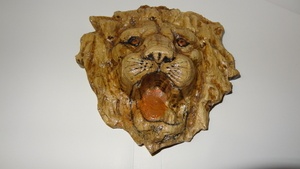Tete lion scultée