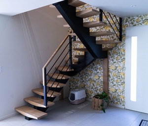 Escalier a limon central double quart tournant