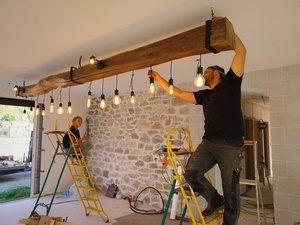 Lustre XXL avec une poutre en chene