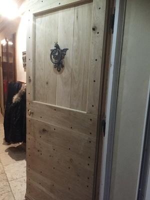 Porte d'entrée style cochonnière