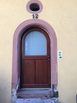 Porte d'entrée plein cintre