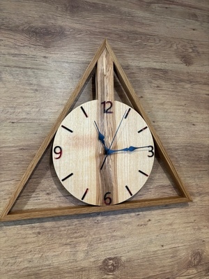 Horloge murale "Les reliques de la mort"