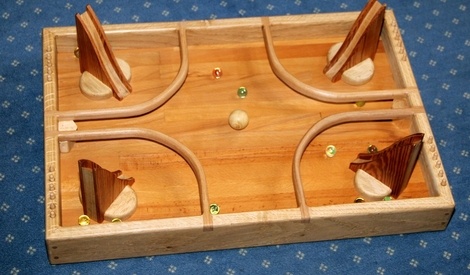 Jeux de billes par Copolo sur L'Air du Bois