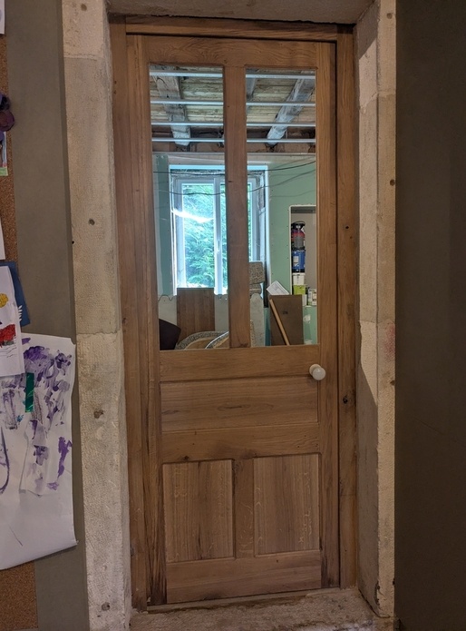 Porte en chêne massif à recouvrement