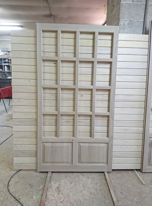 Porte intérieur en chêne avec petit bois assemblée