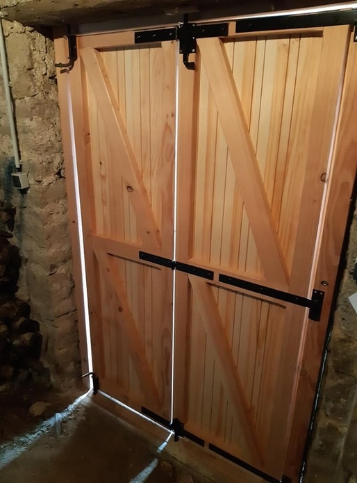 Porte articulée en douglas