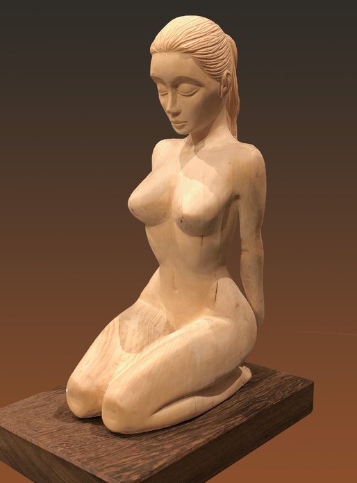 Jeune fille agenouillée