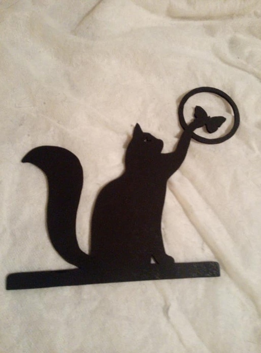 Le chat et son papillon