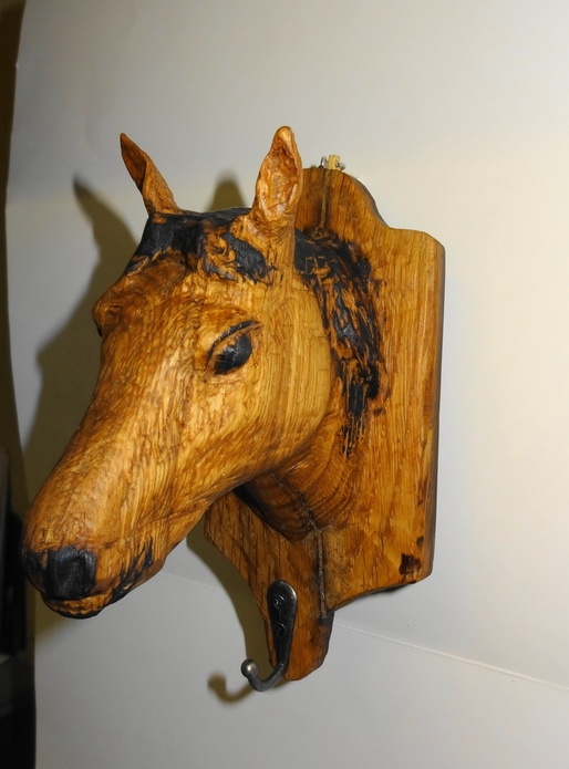 Tete cheval sur platine murale  scultée