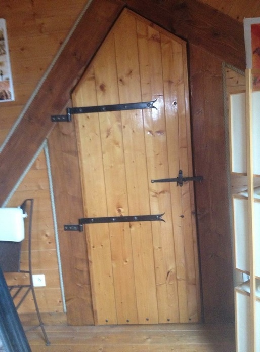 Porte en lames de parquet en soupente