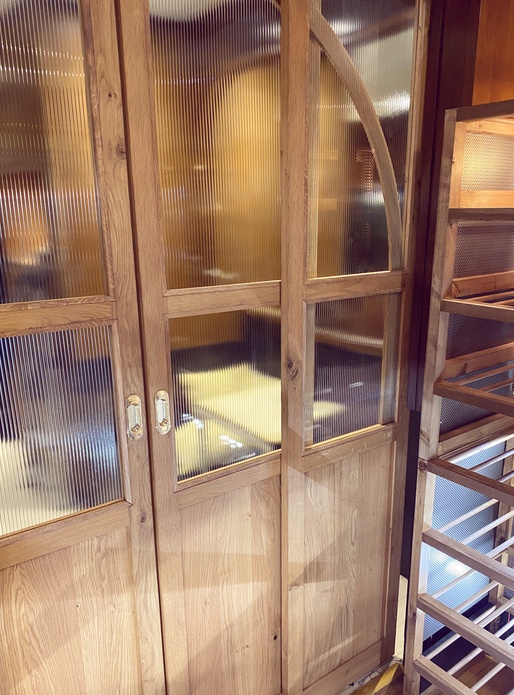 Porte coulissante chêne et vitrage