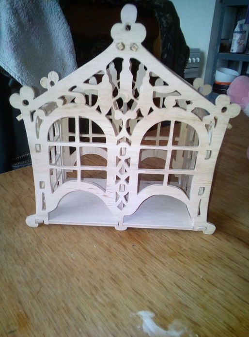 Maison cache capsule de café