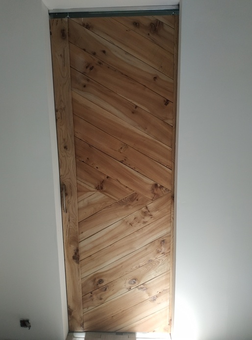 Porte coulissante en orme