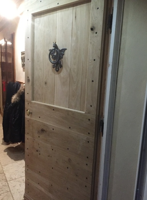 Porte d'entrée style cochonnière